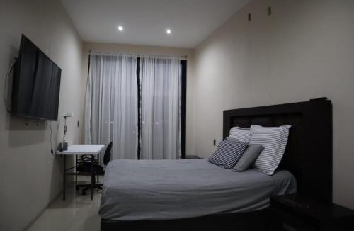 Zapopan House | Habitación calmada