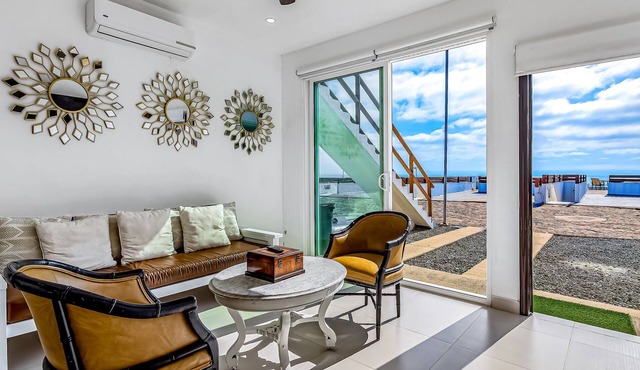 Dog-friendly ocean-view retreat with pool access plus rooftop deck, AC