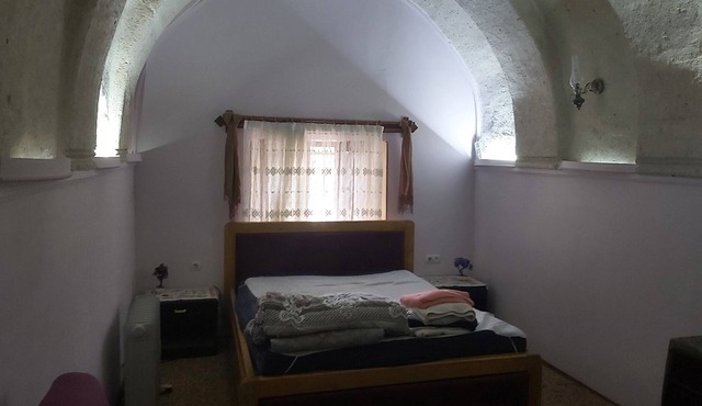 Typical stone house with arches